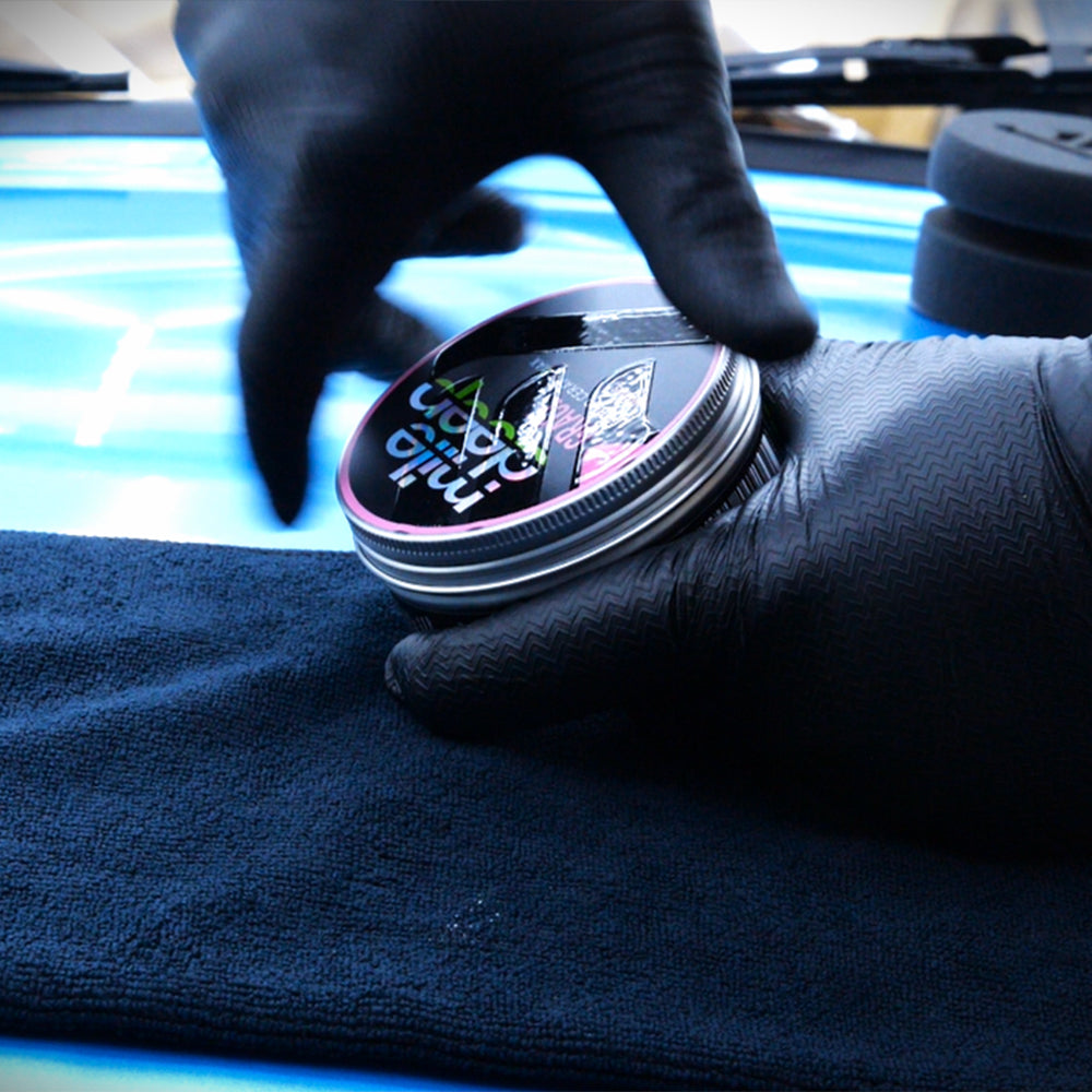 grace hybrid ceramic car wax in hands